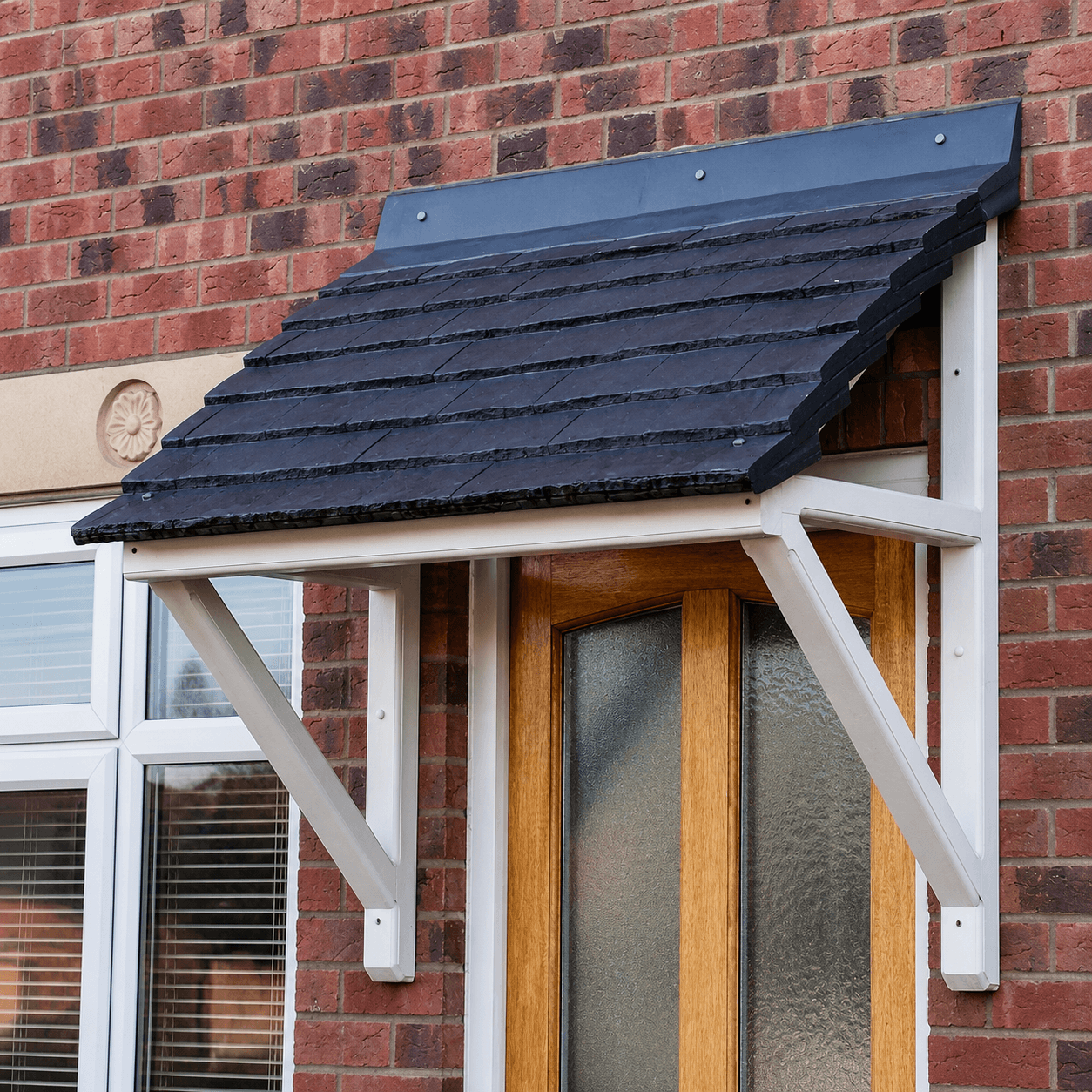 The Tamworth Pitched Tiled Effect Over Door Canopy with Fully Moulded Brackets Image
